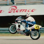 Wayne Gardner popping a wheelie