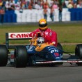 Nigel-mansell-gives-ayrton-senna-a-lift